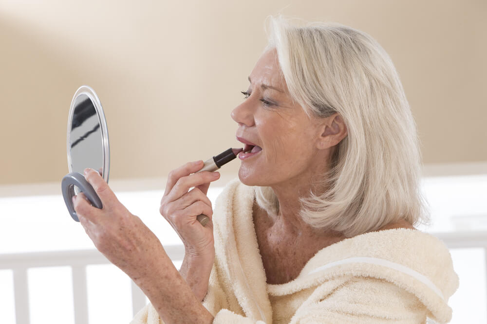 older woman getting ready for date